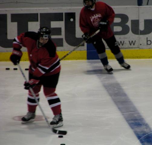 Dee playing hockey