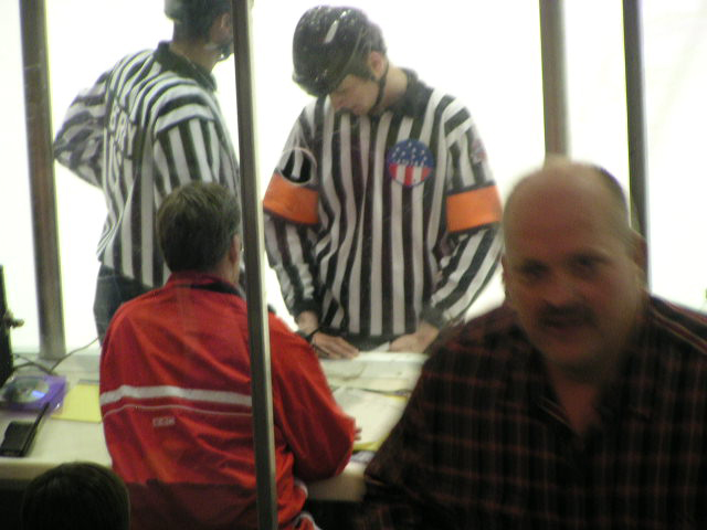 Referee looks in rule book
